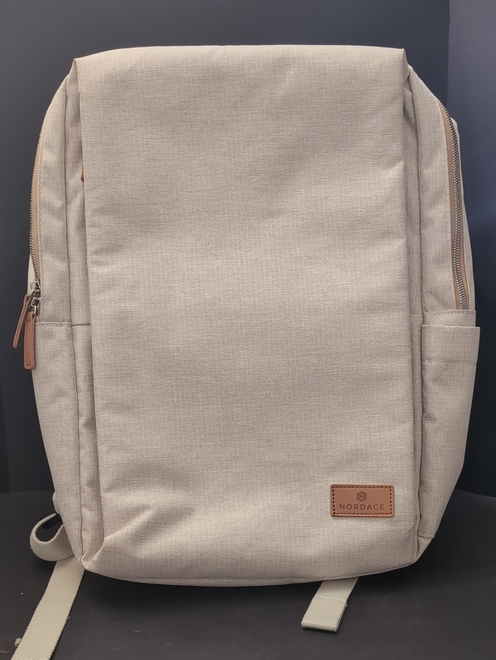 Nordace Siena Beige Waterproof Smart Backpack.